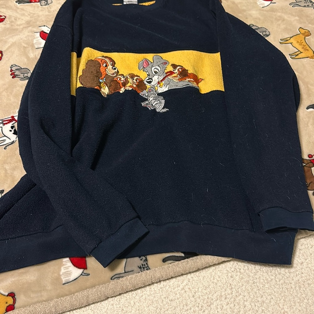 This Disney lady and the tramp sweater is adorable warm and collectable